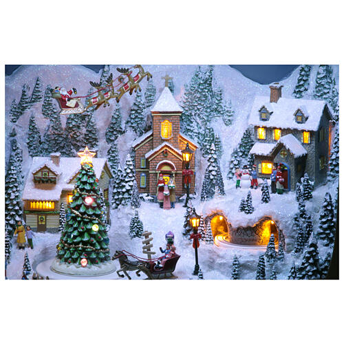 Vintage television with miniature Christmas village in motion, 18x24x10 in 4