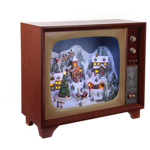 Vintage television with miniature Christmas village in motion, 18x24x10 in 5