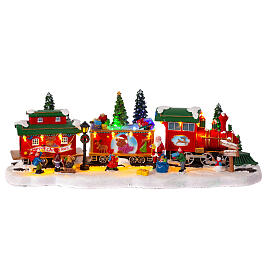 Christmas train with tree in motion 6x20x8 in