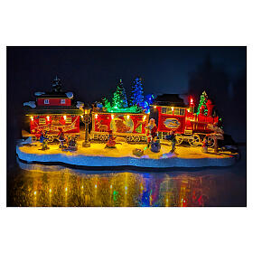 Train de Noël avec sapin en mouvement 15x50x20 cm