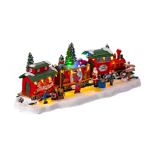 Train de Noël avec sapin en mouvement 15x50x20 cm 6