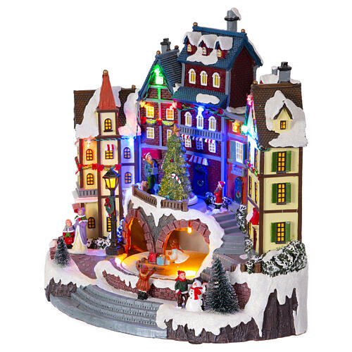 Snowy Christmas village with animated tree, 12x12x8 in 4