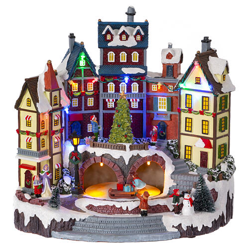 Village de Noël enneigé avec sapin animé 30x30x20 cm 1