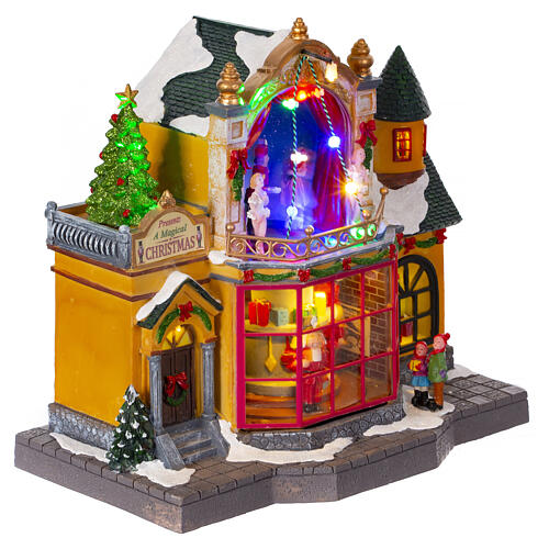 Animated toy shop Christmas village 30x20x30 cm 6