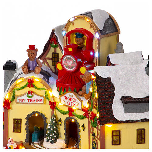 Winterdorf, Spielzeuggeschäfte und beweglichen Zug, 25x20x30 5