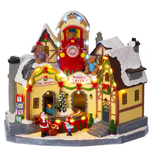 Christmas village set: toyshop with train, 10x8x12 in 1