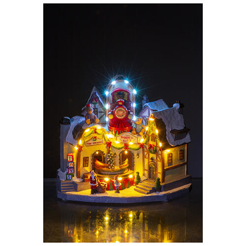 Christmas village toy shop with train 30x25x20 cm 2