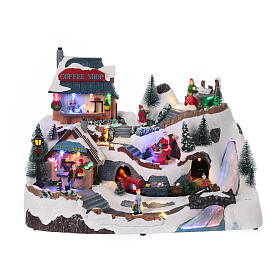 Animated Christmas village with coffee shop 25x40x25cm