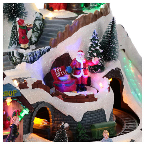 Animated Christmas village with coffee shop 25x40x25cm 4