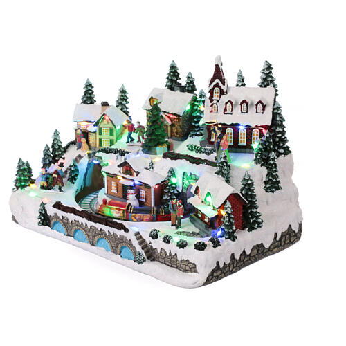 Christmas village with train in motion and spinning tree, 10x12x10 in 3
