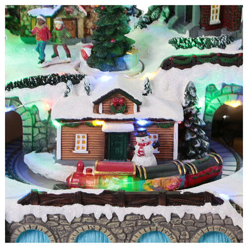 Christmas village with train in motion and spinning tree, 10x12x10 in 4