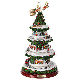 Christmas village set: Christmas tree with train in motion and Santa's sleigh, 20x10x10 in