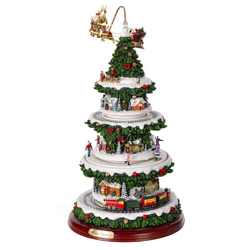 Christmas village set: Christmas tree with train in motion and Santa's sleigh, 20x10x10 in 4