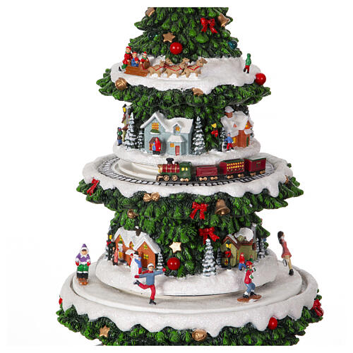Christmas village set: Christmas tree with train in motion and Santa's sleigh, 20x10x10 in 7