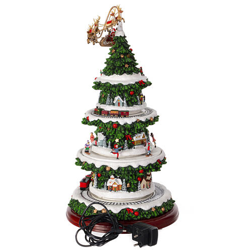 Christmas village set: Christmas tree with train in motion and Santa's sleigh, 20x10x10 in 8