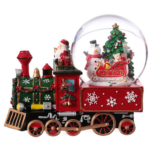Esfera de vidrio tren Papá Noel con música 20x20x15 1
