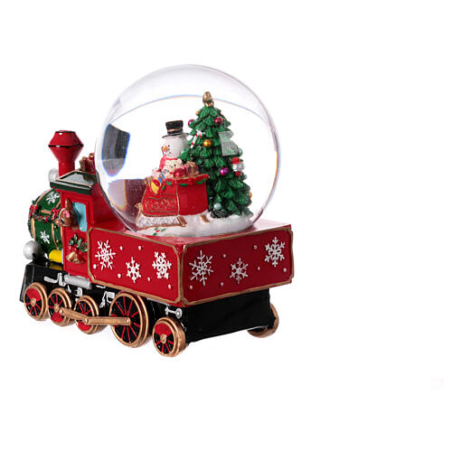 Esfera de vidrio tren Papá Noel con música 20x20x15 6