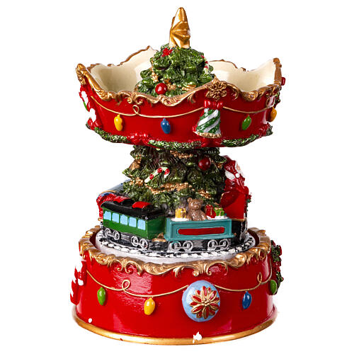 Christmas carousel music box with Santa Claus on the train 15x10x10 cm 3