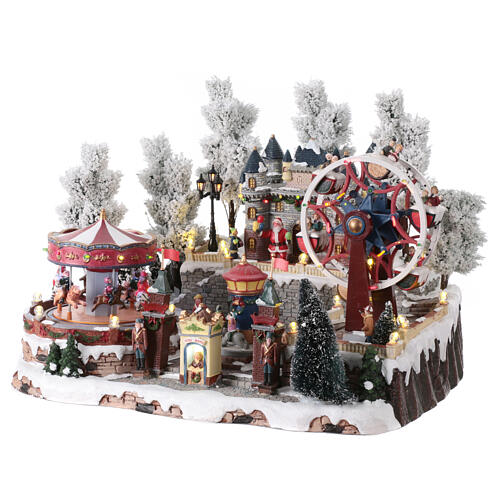 Christmas village with carousel and big wheel, LED lights and music, 12x18x14 in 3