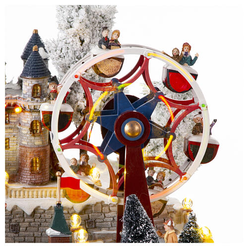 Christmas village with carousel and big wheel, LED lights and music, 12x18x14 in 6