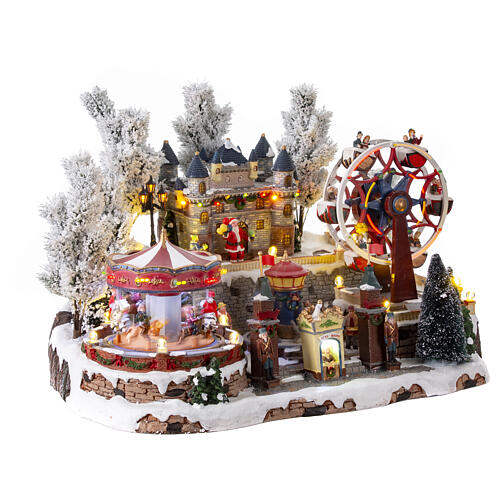 Christmas village with carousel and big wheel, LED lights and music, 12x18x14 in 7