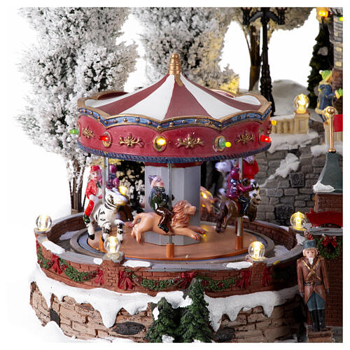 Christmas village with carousel and big wheel, LED lights and music, 12x18x14 in 8