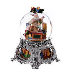 Christmas snow globe with music box: Santa creating toys with his elves, 10x8x8 in