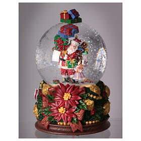 Boîte à musique Père Noël petite fille et cadeaux 25x15x15 cm couronne de Noël boule à neige