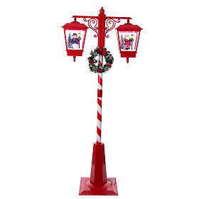 Double snowy Christmas street lamp with music lights 190x80x40 cm