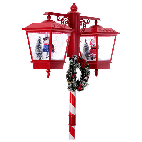 Double snowy Christmas street lamp with music lights 190x80x40 cm 12