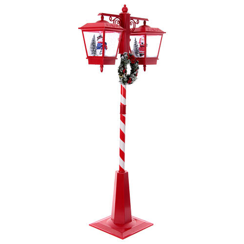 Double snowy Christmas street lamp with music lights 190x80x40 cm