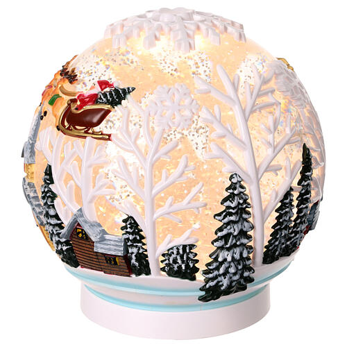 Illuminated snow globe with glitter, Santa Claus on his sleigh, 6x6x6 in 3