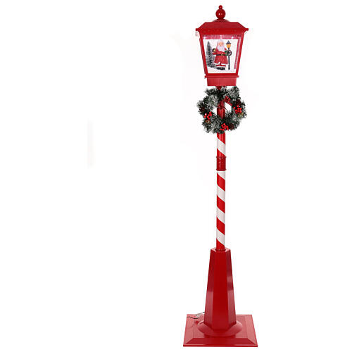 Red streetlight with Santa Claus, snowfall, lights and music, 70 in 1