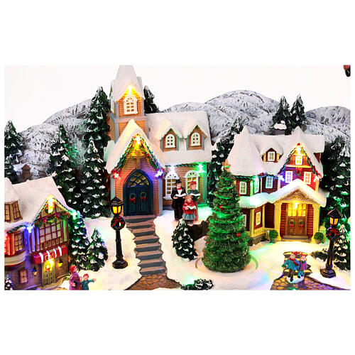 Weihnachtslandschaft mit fliegendem Weihnachtsmann, Schlitten, Rentieren, LED-Beleuchtung und Musik – 47×97,5×25,5 cm 7