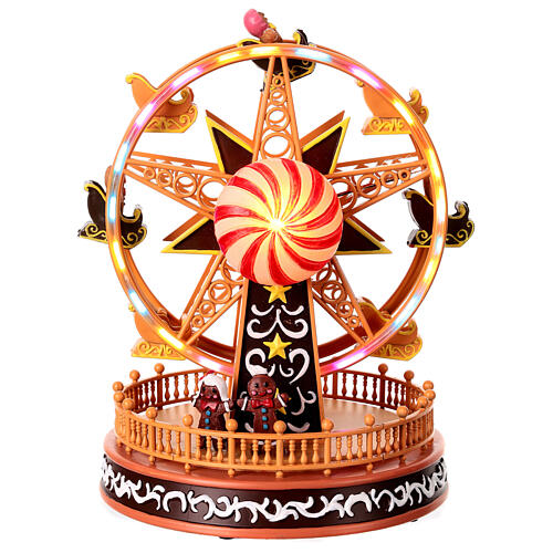 Weihnachtsdeko, Riesenrad mit Lebkuchenmännchen, Bewegung, LED-Beleuchtung und Musik – 23,5×18×18 cm 1