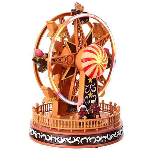 Weihnachtsdeko, Riesenrad mit Lebkuchenmännchen, Bewegung, LED-Beleuchtung und Musik – 23,5×18×18 cm 3