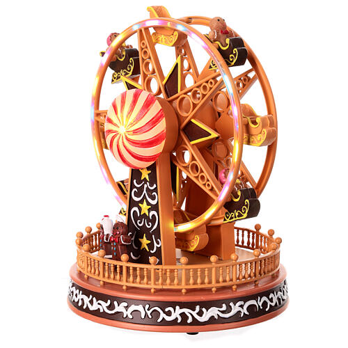 Big wheel with gingerbread finish, motion lights and music, 10x8x8 in 5