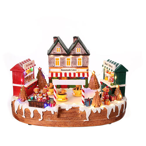 Christmas village set, rink with teacup ride, lights and music, 10x14x8 in 1