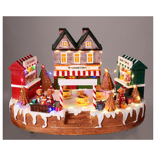 Christmas village set, rink with teacup ride, lights and music, 10x14x8 in 2