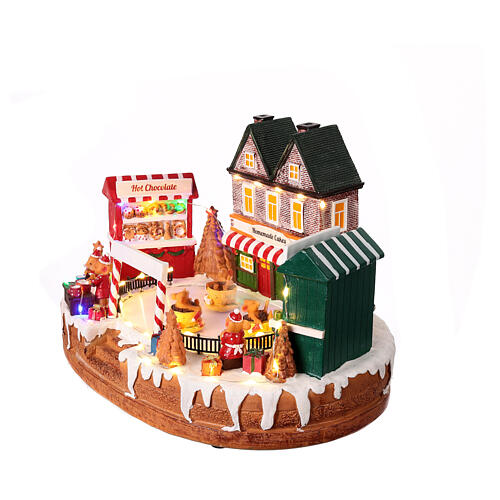 Christmas village set, rink with teacup ride, lights and music, 10x14x8 in 4