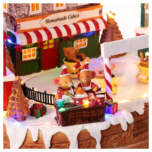 Christmas village set, rink with teacup ride, lights and music, 10x14x8 in 5