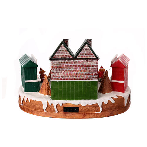 Christmas village set, rink with teacup ride, lights and music, 10x14x8 in 9