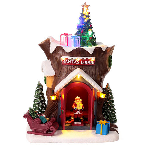 Tronco navideño casa Papá Noel movimiento luces movimiento 25x20x15 cm 1