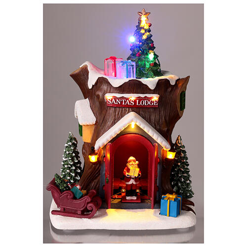 Tronco navideño casa Papá Noel movimiento luces movimiento 25x20x15 cm 2