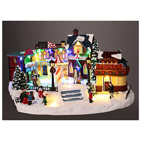 Weihnachtsszene mit Karussell – mit Licht, Musik und Bewegung, 20 × 40 × 30 cm