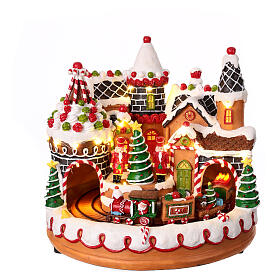 Christmas village set with gingerbread finish, train in motion and music, 10x10x10 in