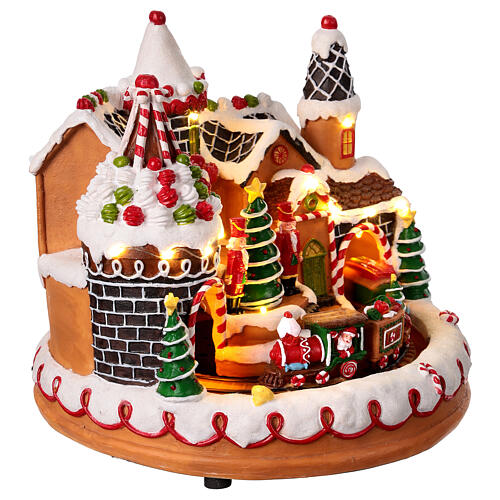 Christmas village set with gingerbread finish, train in motion and music, 10x10x10 in 4