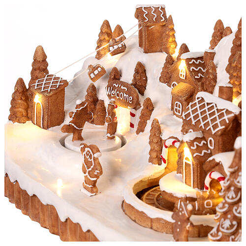 Gingerbread village with music, lights and animated train, 8x16x5 in 3