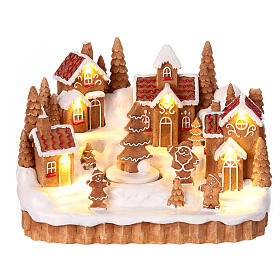 Snowy village gingerbread tree movement 15x25x15 cm