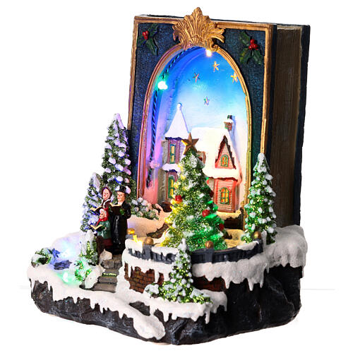 Scène Noël livre sapin mouvement 25x20x15 cm 3